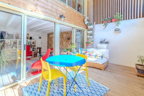 Ancien atelier réhabilité en maison de ville avec patio