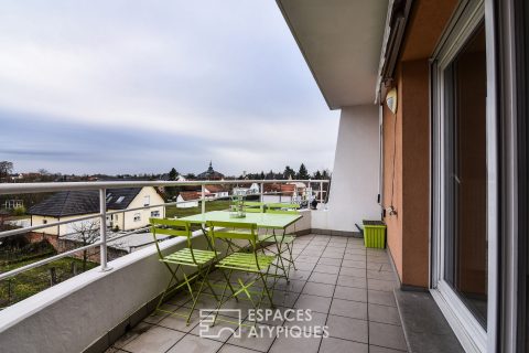 Duplex plafond cathédrale avec terrasse