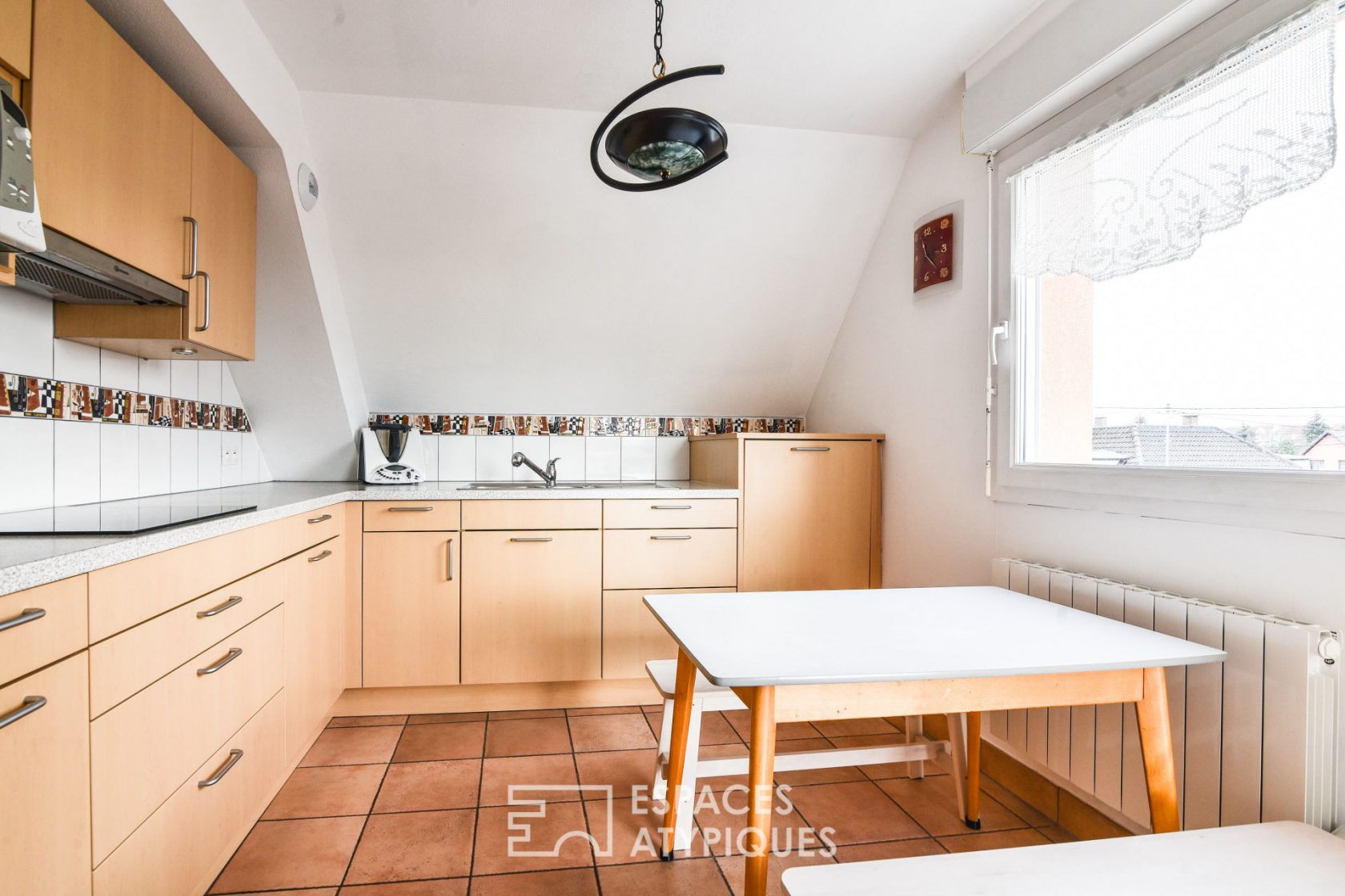 Duplex cathedral ceiling with terrace