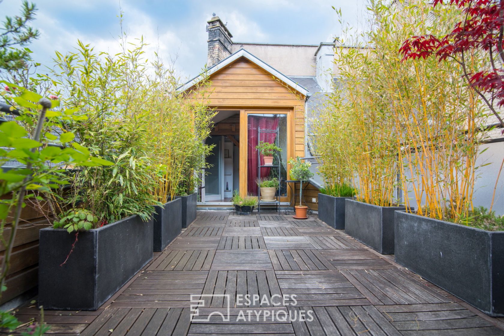 Duplex sur les toits et sa terrasse