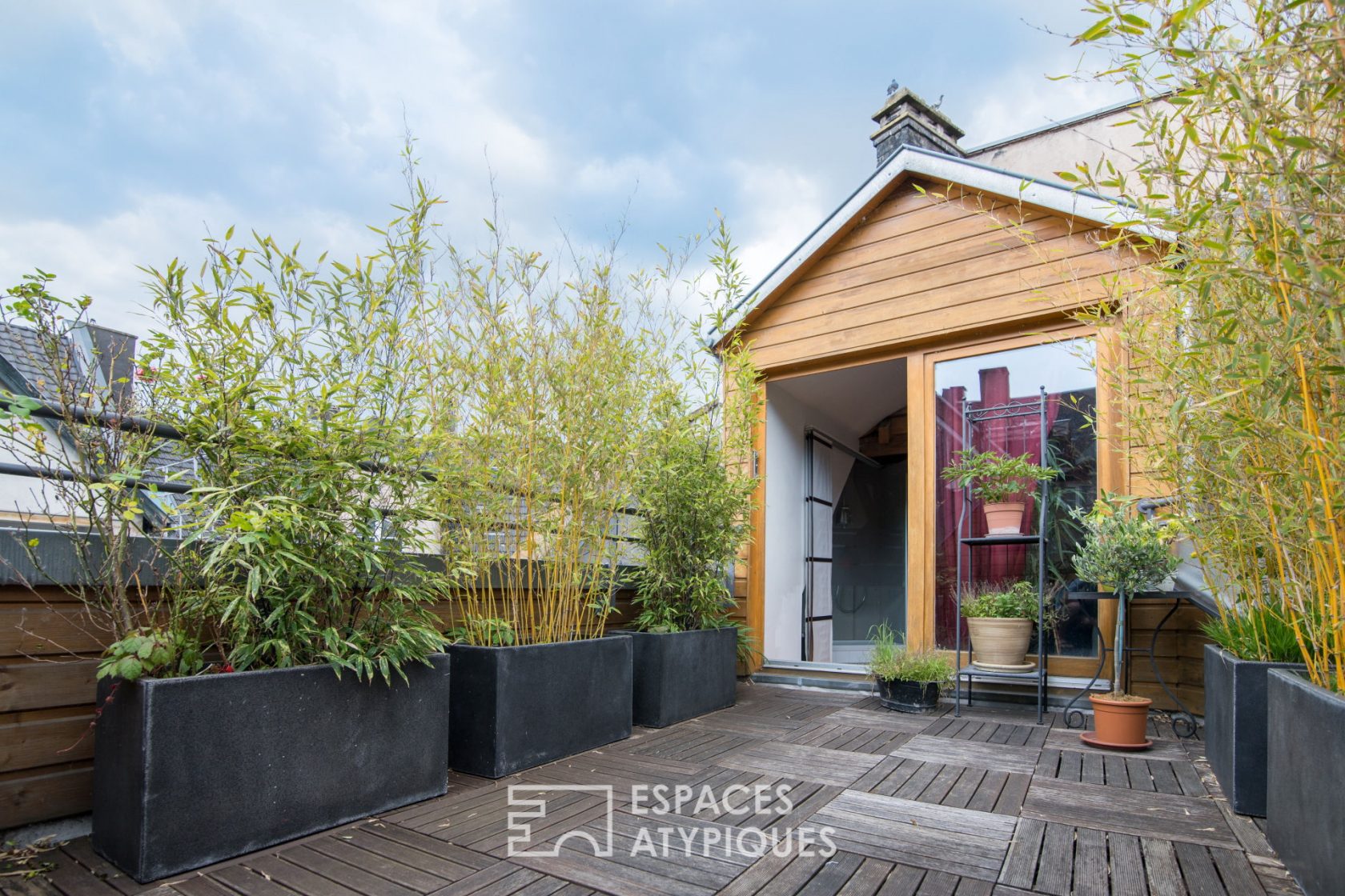 Duplex sur les toits et sa terrasse