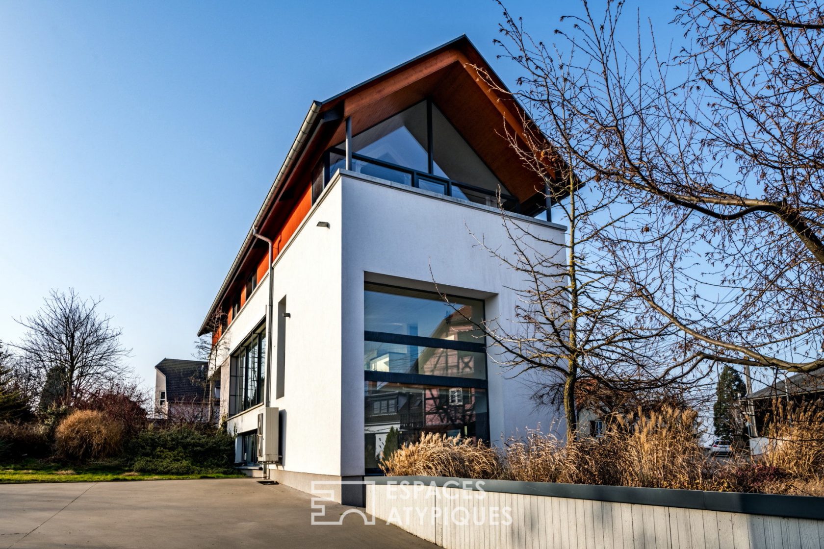 Maison d’architecte et son jardin arboré