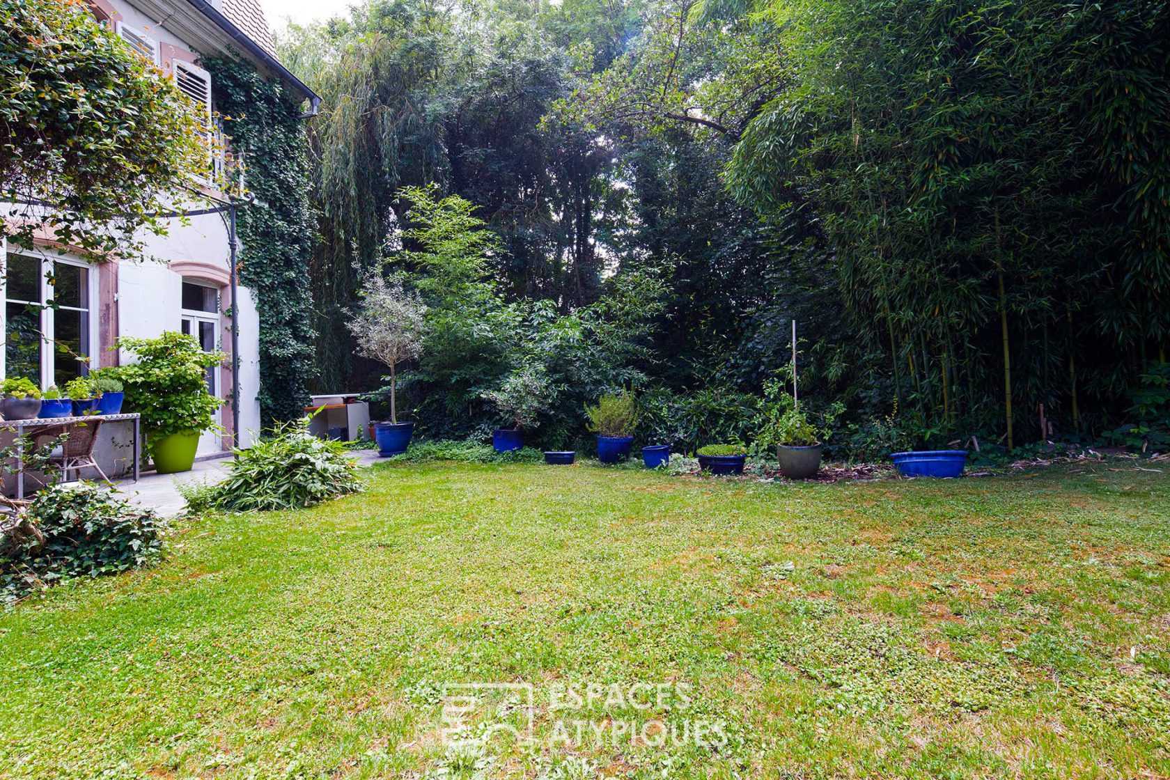 Duplex et son jardin dans une maison de maître