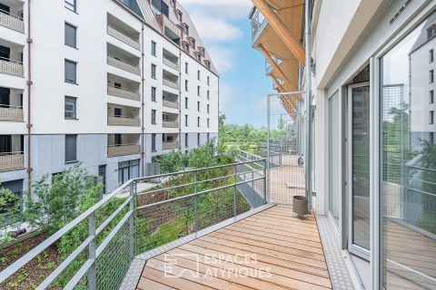 DÉJÀ LOUÉ : Duplex et sa terrasse au coeur des Deux Rives