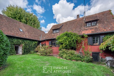 Authentic Alsatian house in its green cocoon with swimming pool