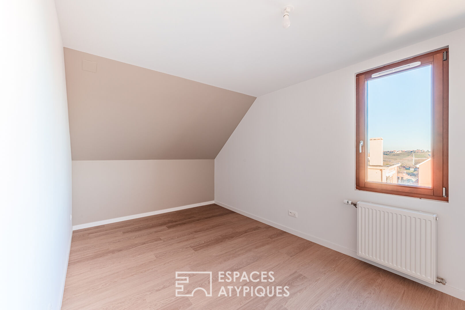 Character flat with terrace in a former winegrower’s house