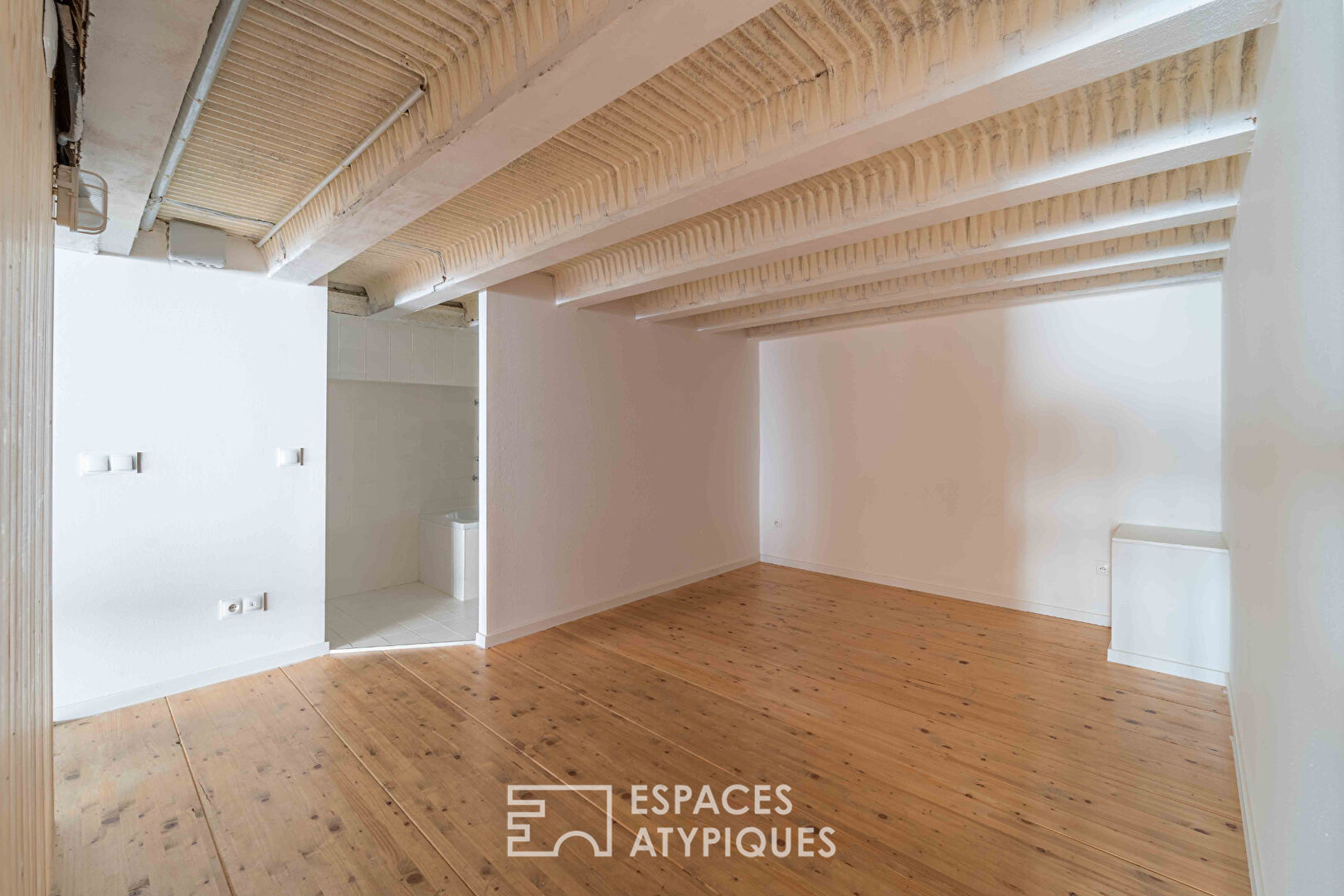 Loft et ses terrasses dans ancien supermarché