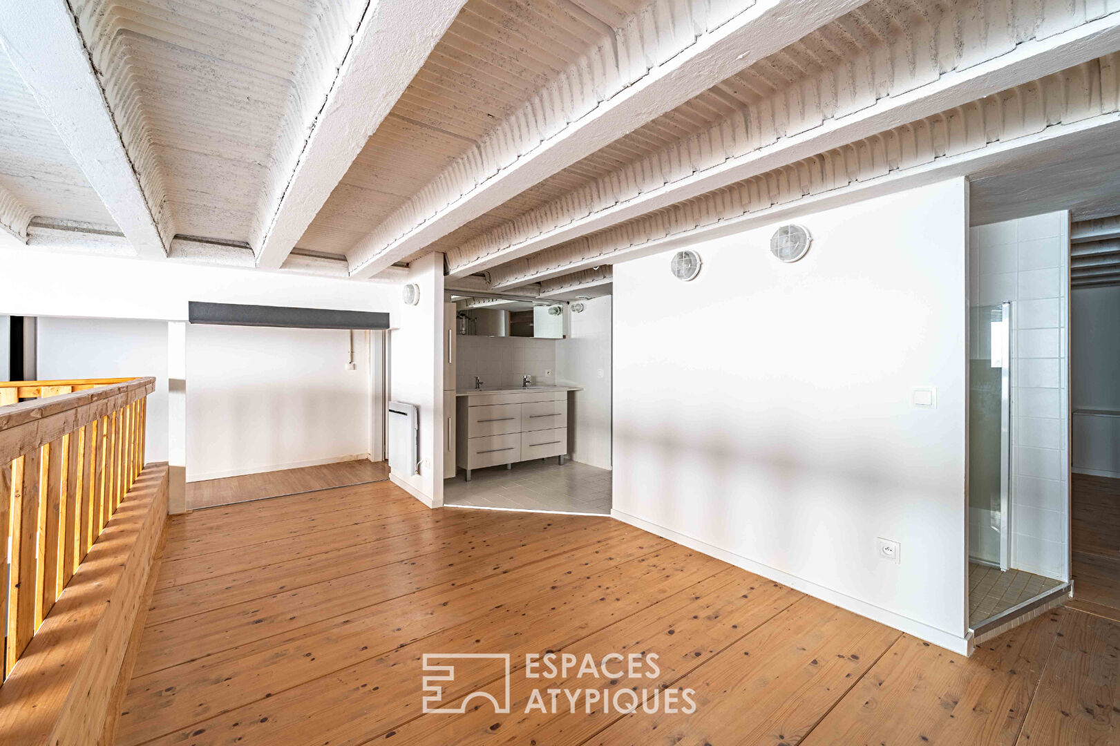 Loft et ses terrasses dans ancien supermarché