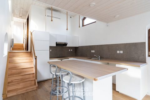 Renovated barge with two terraces on the water