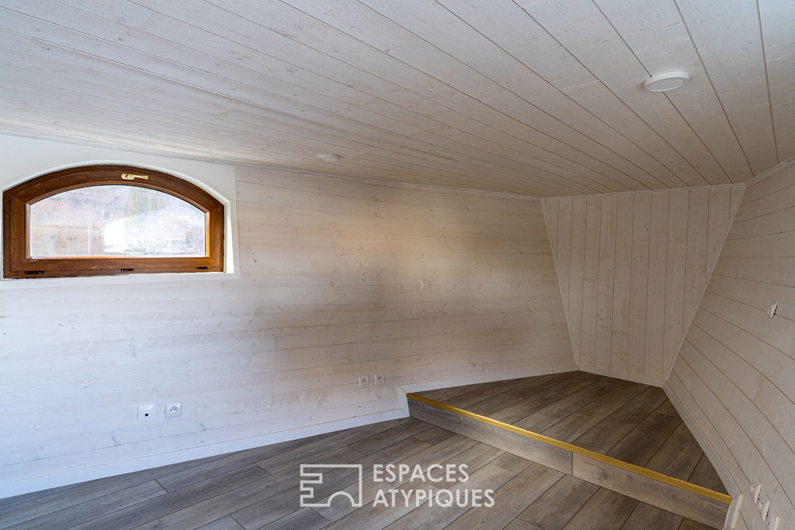 Renovated barge with two terraces on the water