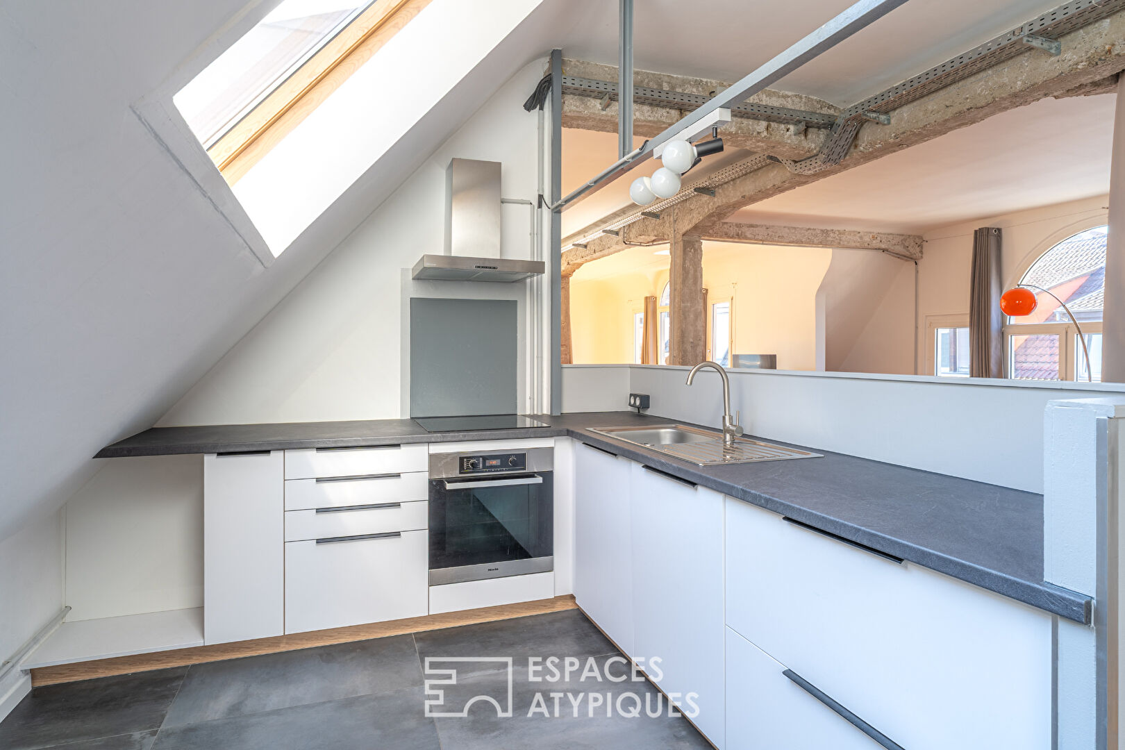 Loft en dernier étage en coeur de ville