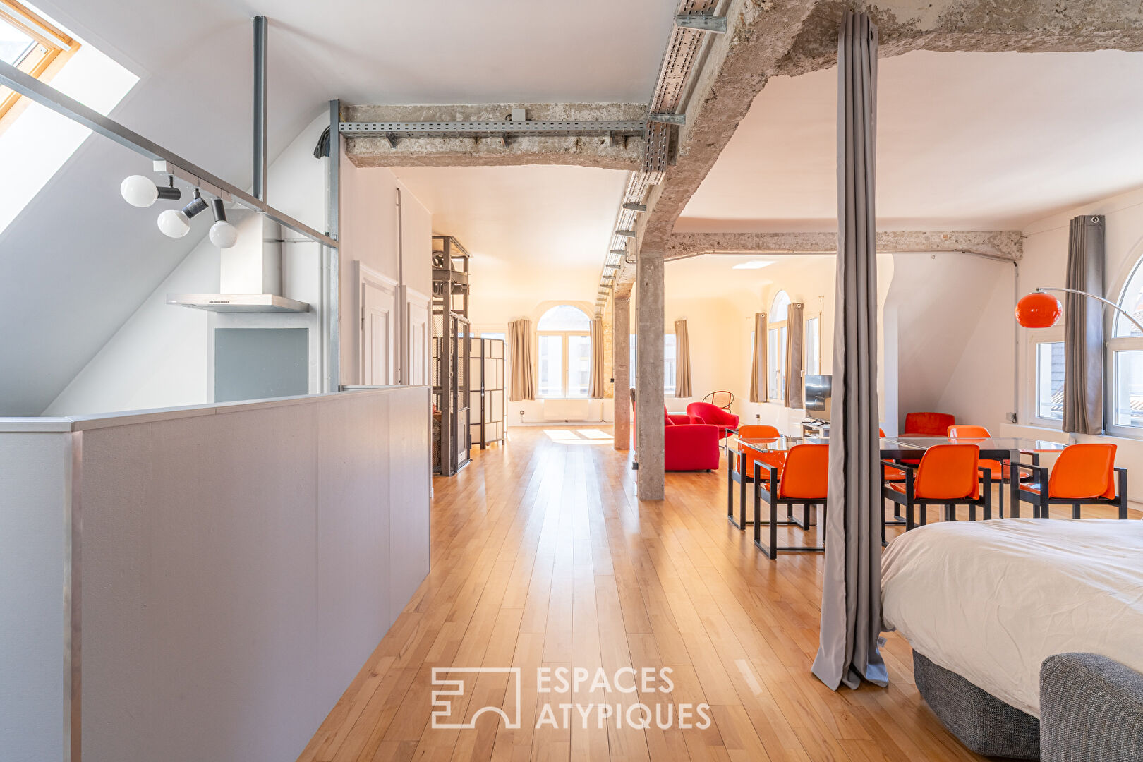 Loft en dernier étage en coeur de ville