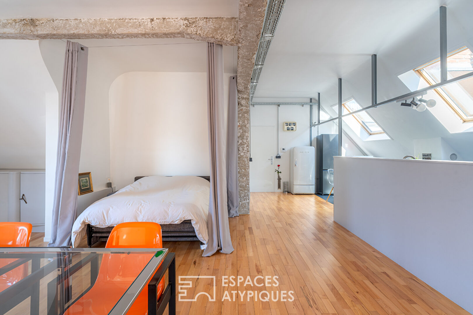 Loft en dernier étage en coeur de ville