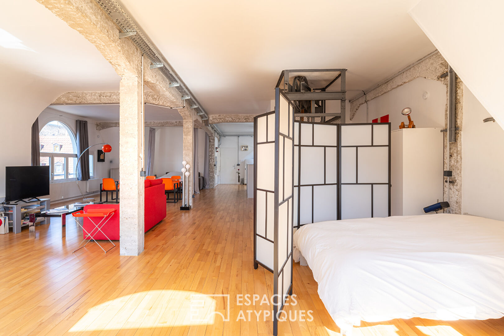 Loft en dernier étage en coeur de ville