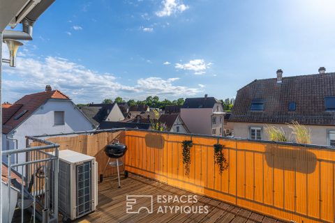 Duplex inversé sous les toits et sa terrasse