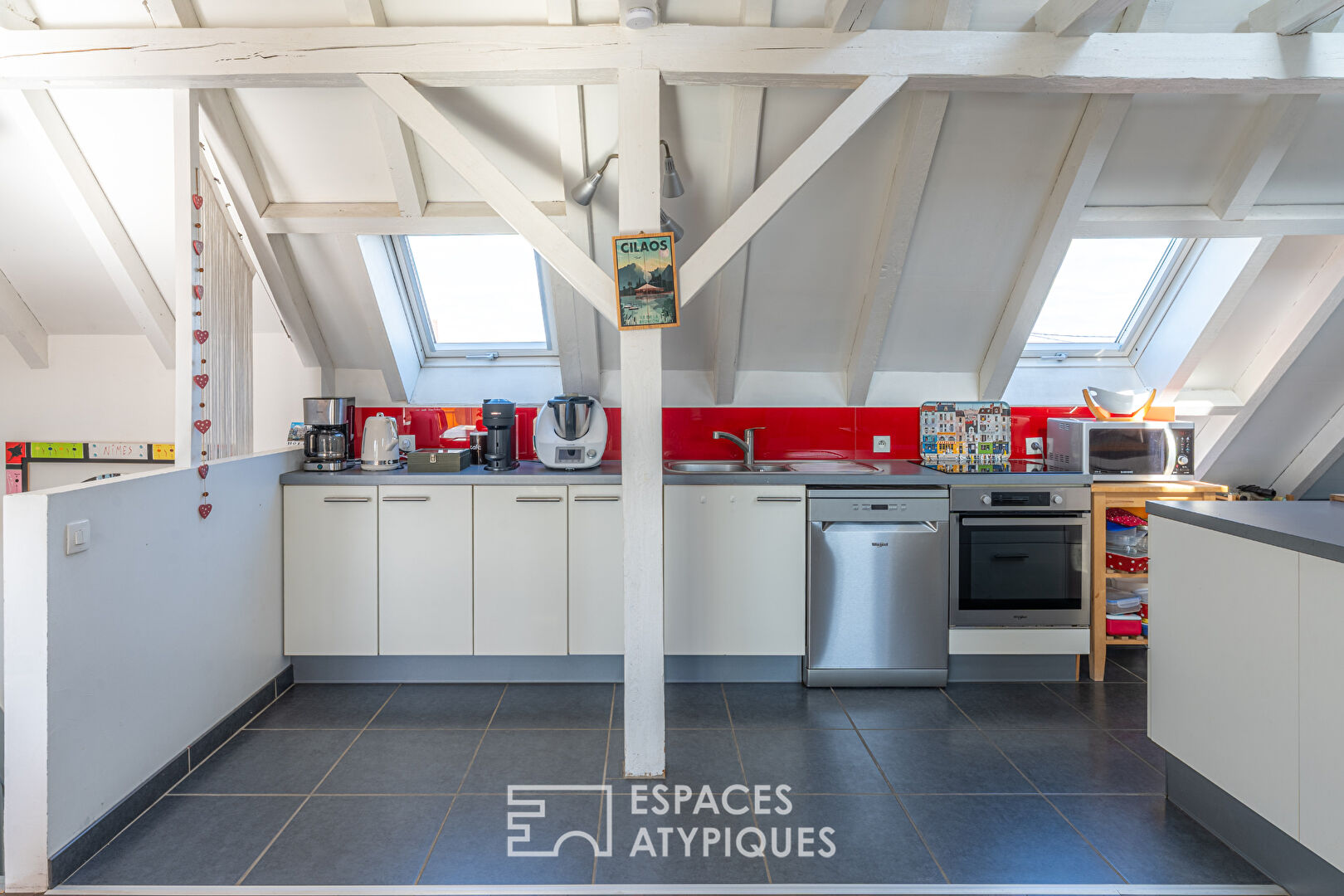 Duplex inversé sous les toits et sa terrasse