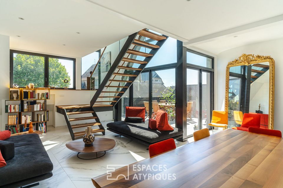 Duplex contemporain aux lignes épurées et ses terrasses