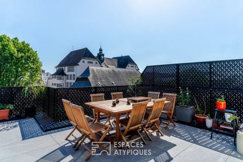Duplex contemporain aux lignes épurées et ses terrasses
