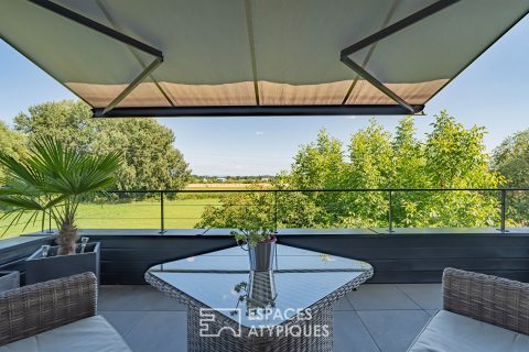 Appartement de caractère avec terrasse et vue dégagée