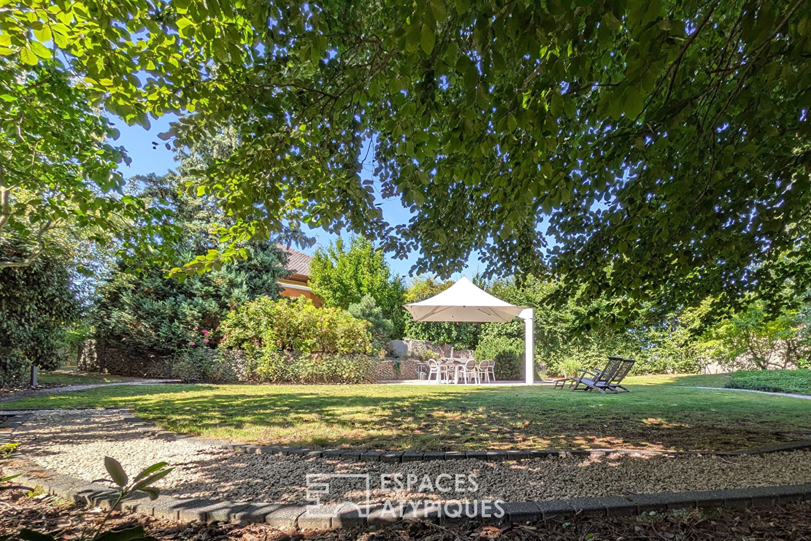 Renovated house with terraces and wooded garden