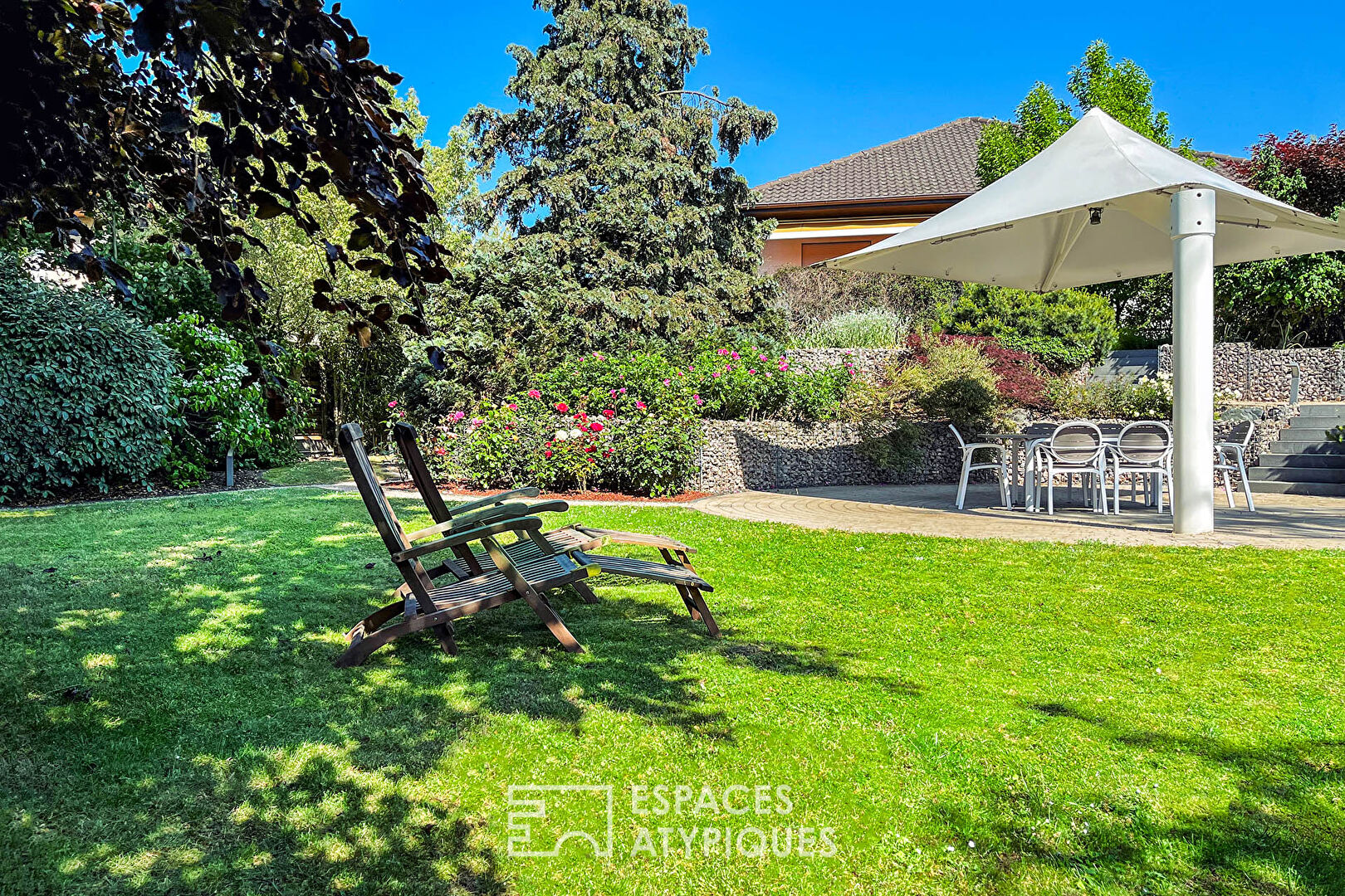Renovated house with terraces and wooded garden