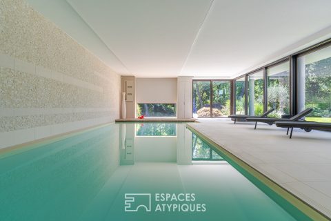 Architect-designed villa with private spa in the heart of a wooded park