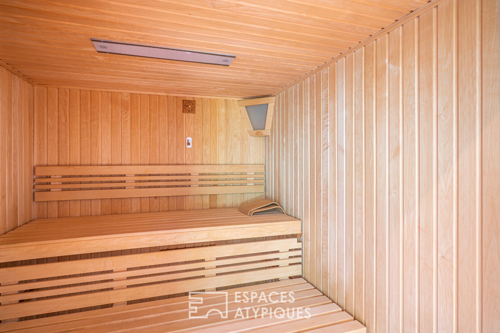 Architect-designed villa with private spa in the heart of a wooded park
