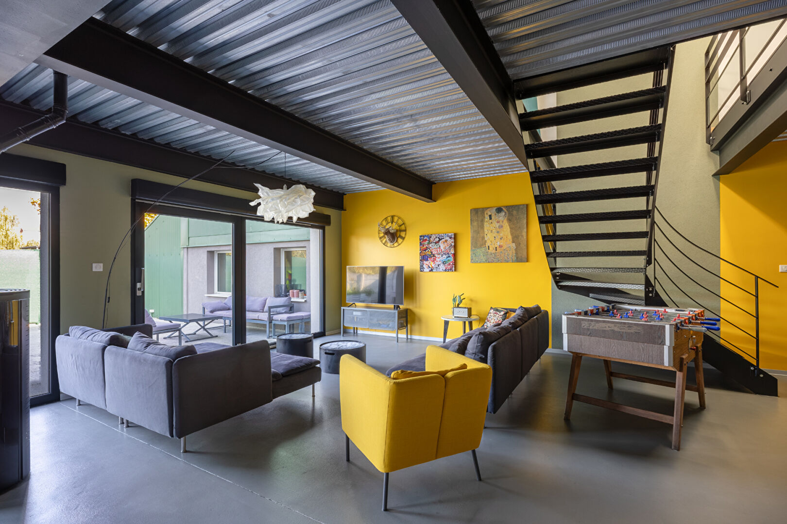 Loft esprit industriel et sa terrasse privative