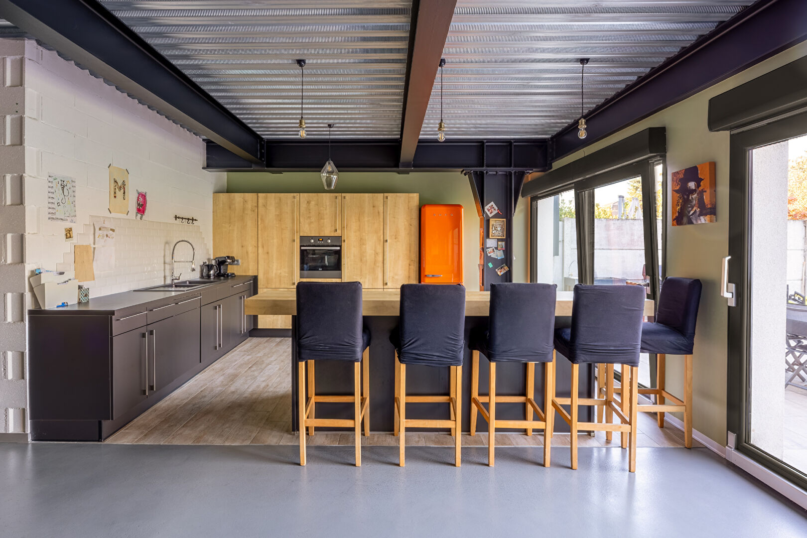 Loft esprit industriel et sa terrasse privative