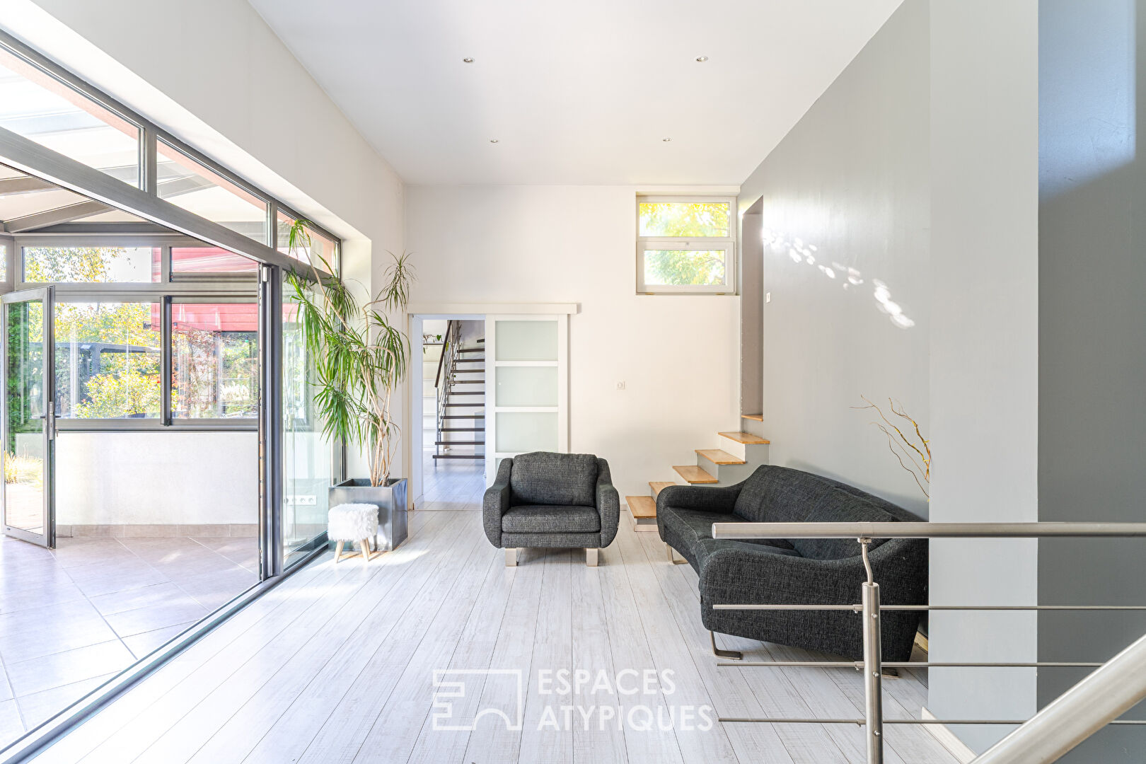 Maison années 30 et son extension contemporaine avec jardin paysagé