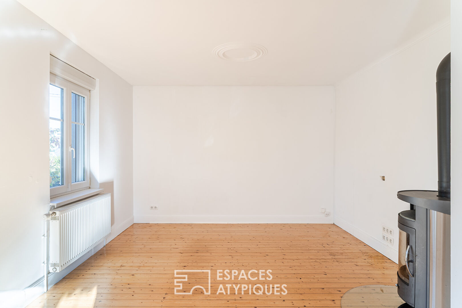 Maison années 30 et son extension contemporaine avec jardin paysagé