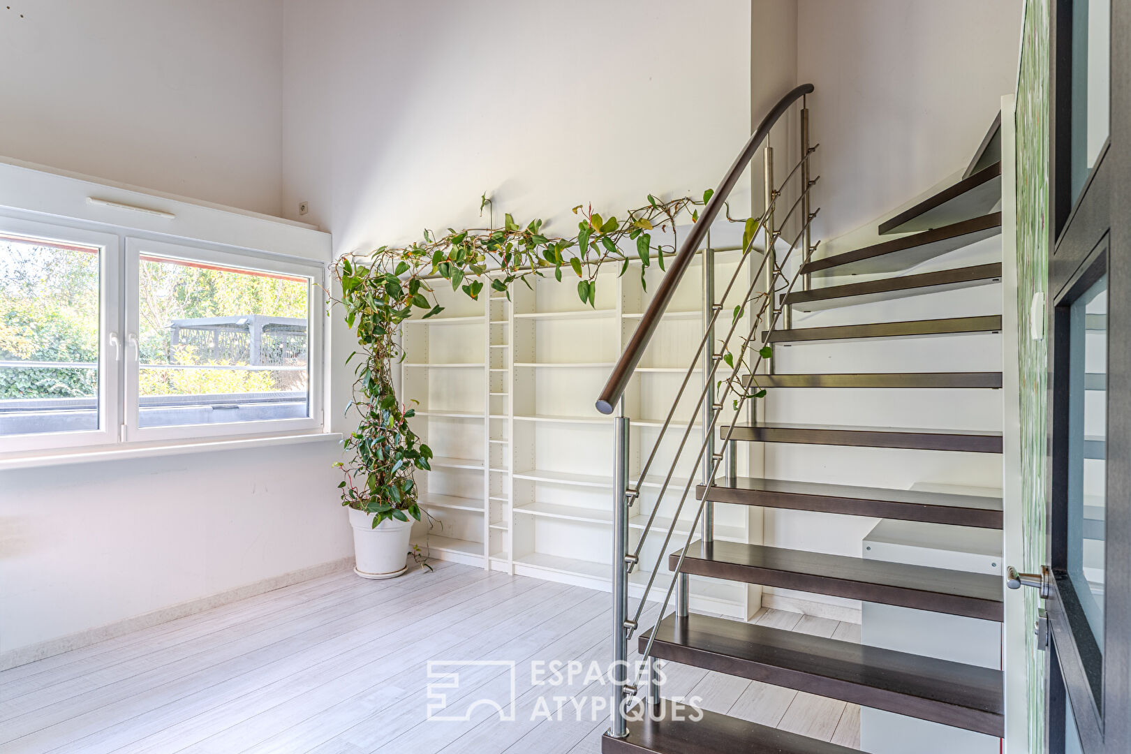 Maison années 30 et son extension contemporaine avec jardin paysagé