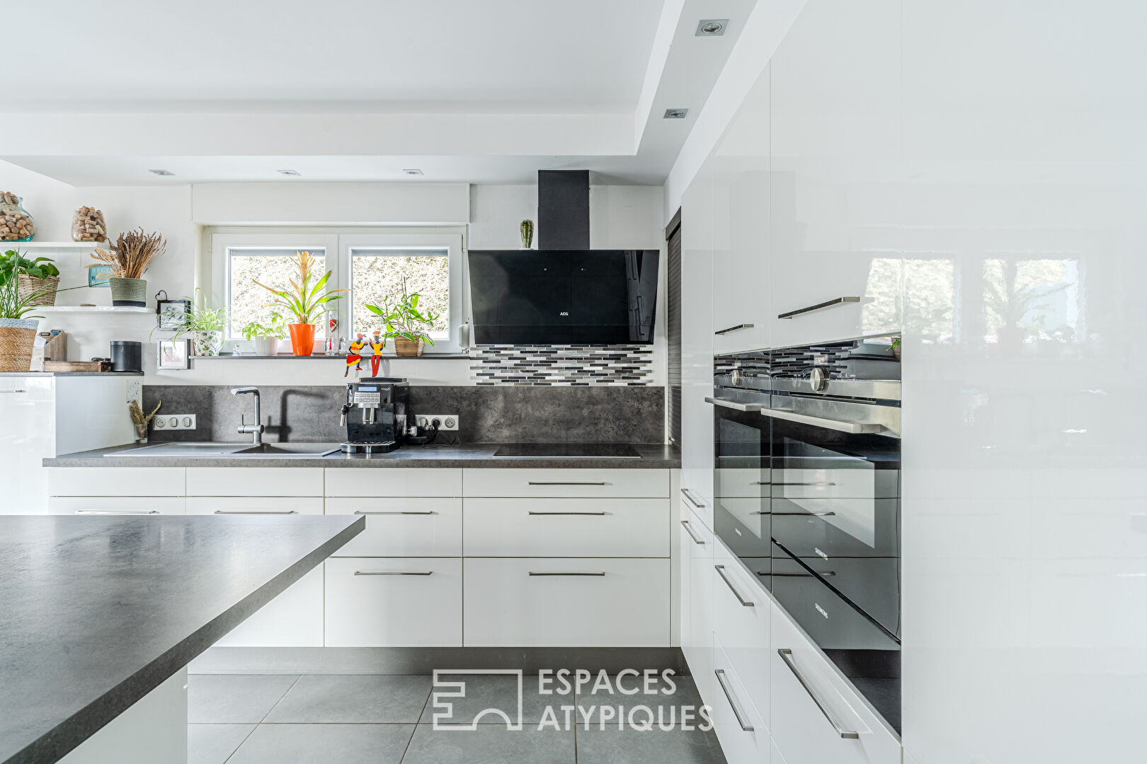 Maison contemporaine et ses terrasses