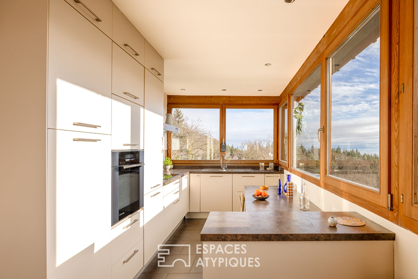 Maison ossature bois avec vue panoramique sur la plaine