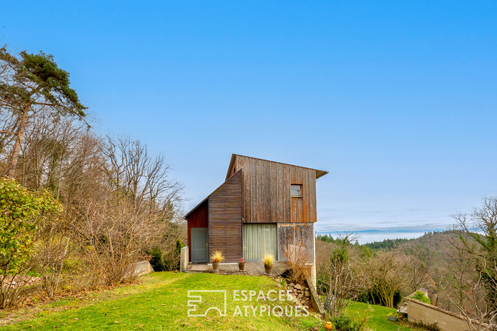 Maison ossature bois avec vue panoramique sur la plaine