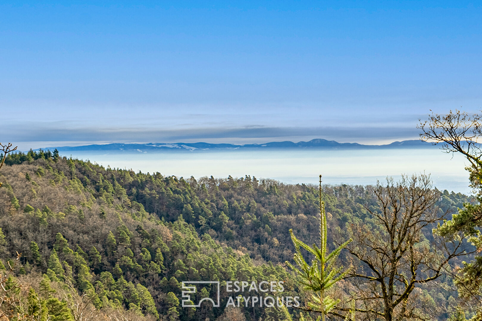 Maison ossature bois avec vue panoramique sur la plaine