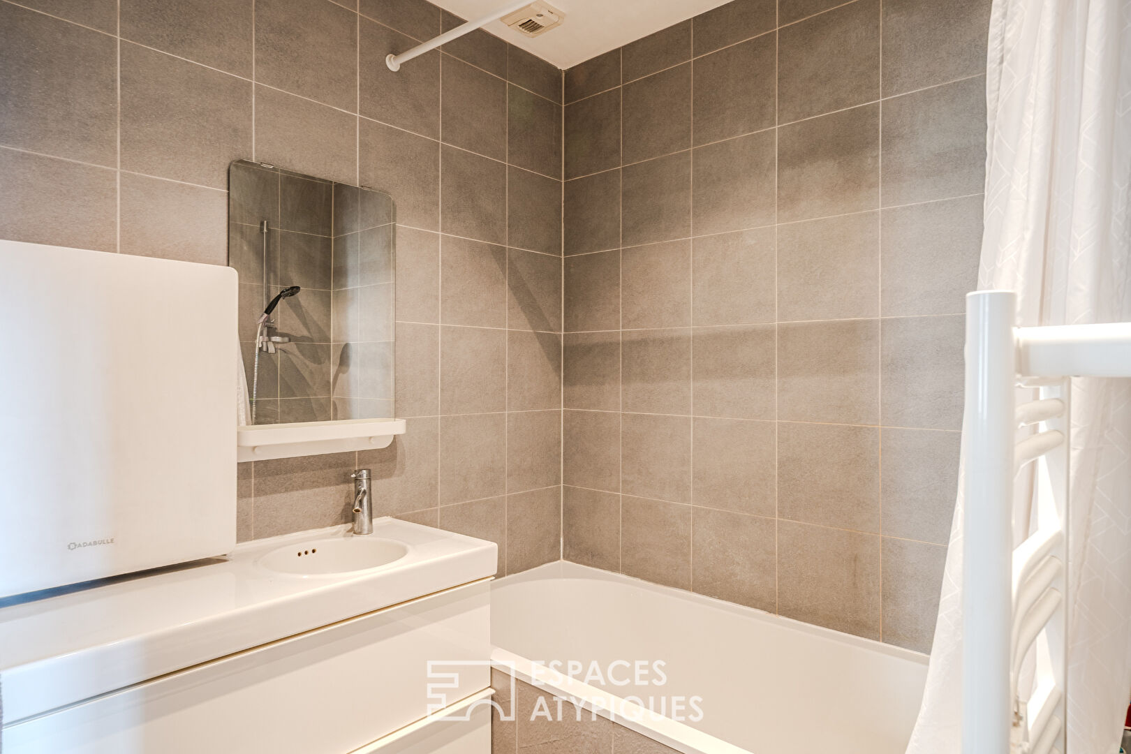 Appartement de caractère rénové au calme d&rsquo;une cour intérieure