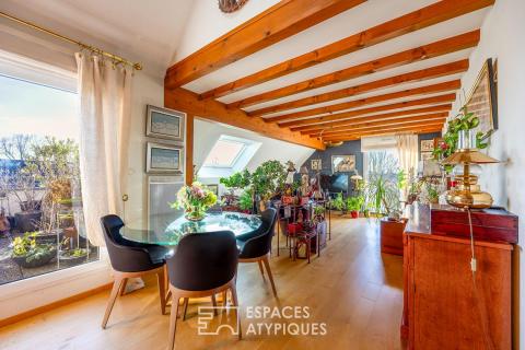 Duplex chaleureux et sa terrasse avec vue dégagée