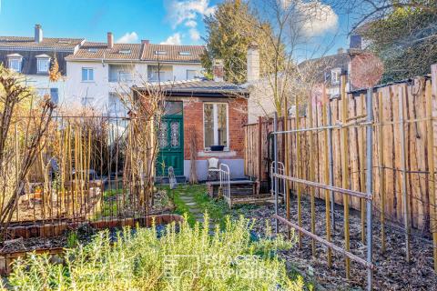 Maison de ville rénovée et son jardin