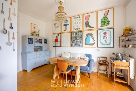 Maison de ville réinventée et son écrin de verdure