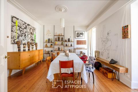 Maison de ville réinventée et son écrin de verdure