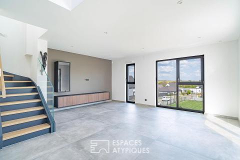 Duplex contemporain comme une maison