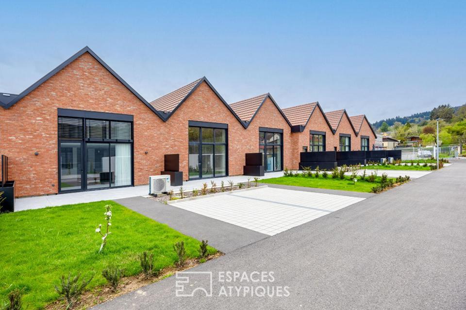 Loft contemporain en duplex et sa terrasse dans une ancienne friche industrielle
