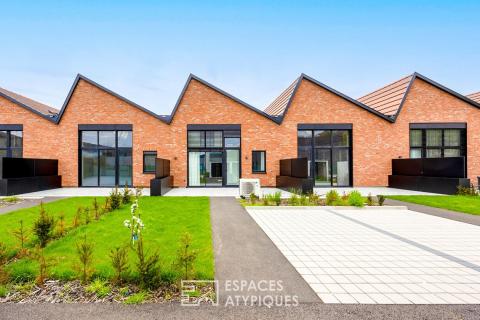 Loft contemporain en duplex et sa terrasse dans une ancienne friche industrielle