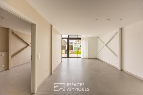 Loft contemporain en duplex et sa terrasse dans une ancienne friche industrielle