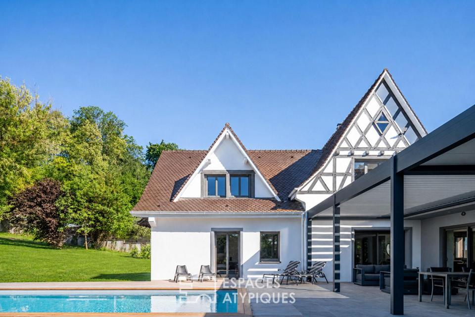 Propriété de caractère avec extension contemporaine et piscine