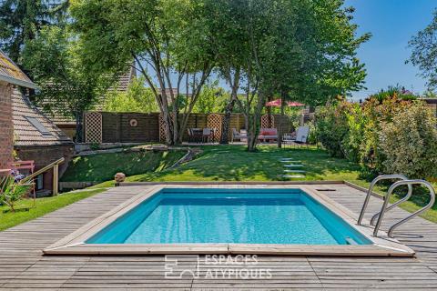 A reimagined Alsatian property with a pool and views