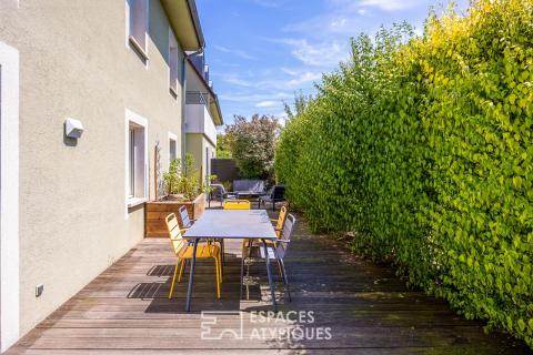 Appartement type loft d&rsquo;architecte avec jardin plein sud