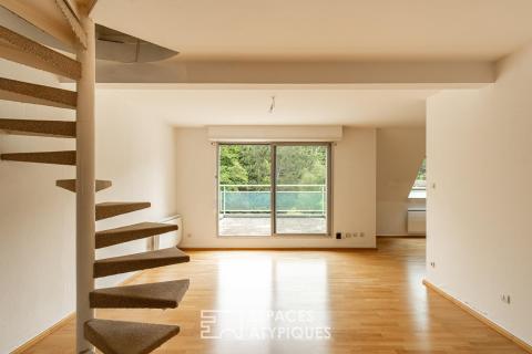 Duplex au dernier étage avec terrasses privatives début Robertsau