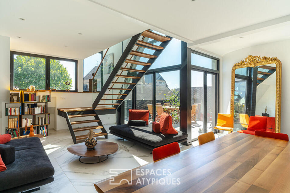 Duplex contemporain aux lignes épurées et ses terrasses
